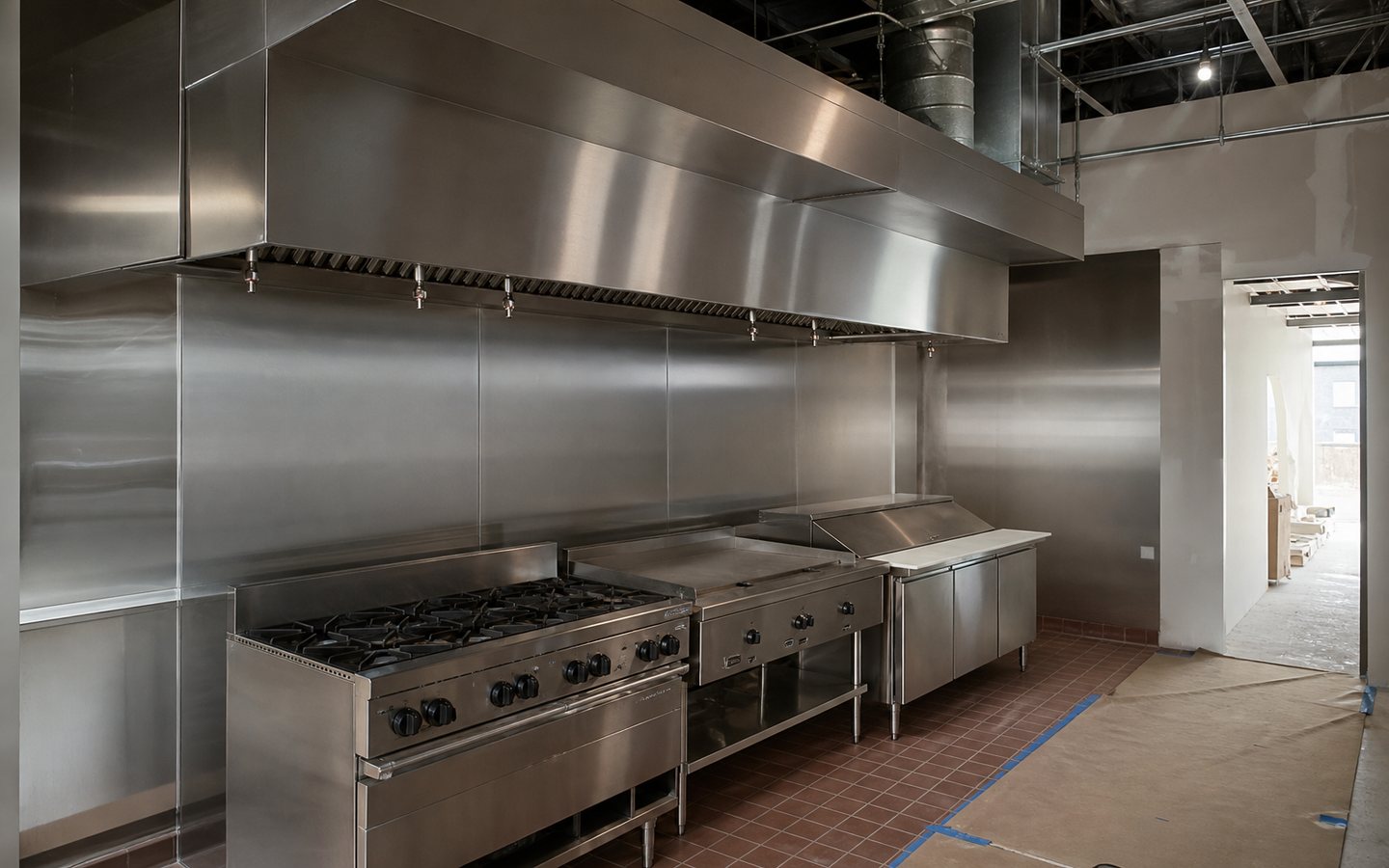 Commercial kitchen hood and cookline installation design inspiration